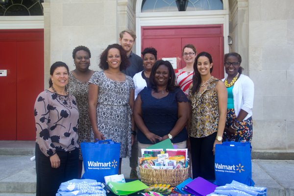 Walmart Director of Community Affairs, Nina Albert (left) with Paul PCS educators during the company's designation of July 25 to 31 as Teacher Appreciation Week at the school in Northwest on Monday, July 28.