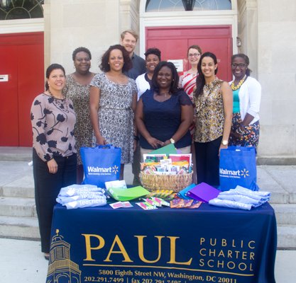 Walmart Director of Community Affairs, Nina Albert (left) with Paul PCS educators during the company's designation of July 25 to 31 as Teacher Appreciation Week at the school in Northwest on Monday, July 28.