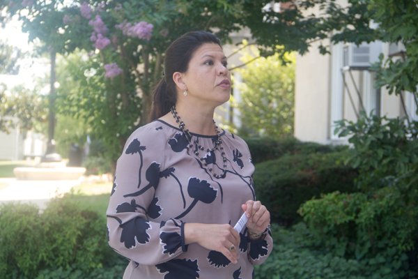 Walmart Director of Community Affairs, Nina Albert, speaks to Paul PCS educators about the company's designation of July 25 to 31 as Teacher Appreciation Week at the school in Northwest on Monday, July 28.