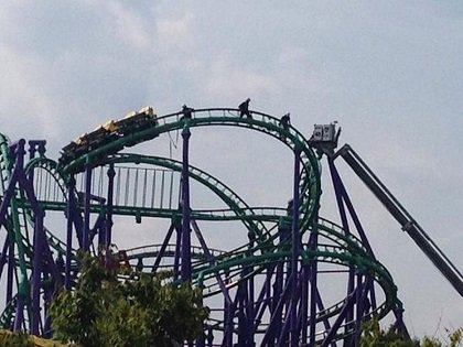 Rescuers pulled stranded riders from a roller coaster at Six Flags America in Maryland on Sunday after the ride halted ... Rescuers pulled stranded riders from a roller coaster at Six Flags America in Maryland on Sunday after the ride halted ...