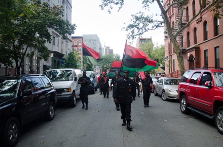 Grassroots activists march down 134th celebrating the legacy of Pan-African icon, Marcus Mosiah Garvey, on his birthday. #HarlemWeek (08/17/2014)