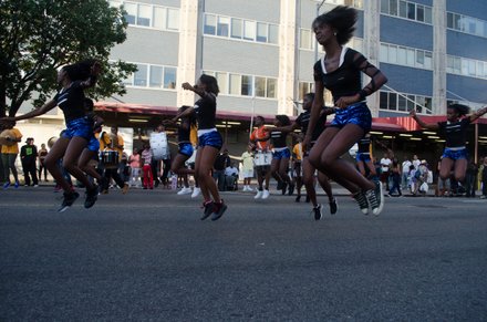 Cheerleaders and a band perform on 135th. #HarlemWeek (08/17/2014)