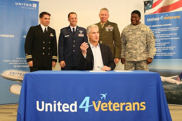 Flanked by veterans and members of the uniformed services, United Airlines Chairman, President and Chief Executive Officer Jeff Smisek today ... Flanked by veterans and members of the uniformed services, United Airlines Chairman, President and Chief Executive Officer Jeff Smisek today ...