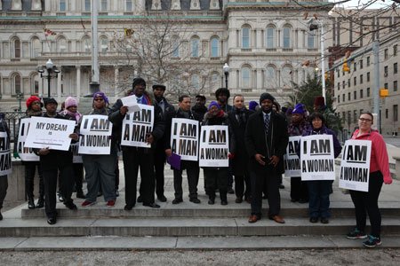 At a candlelight vigil on Friday, January 16, 2015, Baltimore security officers, local clergy and elected officials called on city ... At a candlelight vigil on Friday, January 16, 2015, Baltimore security officers, local clergy and elected officials called on city ...