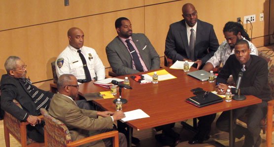 The Reginald F. Lewis Museum presented “A Community Roundtable Conversation: Healing Beyond Ferguson” at the MLK Day Commemoration on January 19, 2015. The discussion was hosted by Farajii Muhammad. The panel included (Left to right): Reverend Al Hathaway, Judge Robert M. Bell, Baltimore City Police Commissioner Anthony Batts, Baltimore City Councilman Nick Mosby, Dr. Lovell Smith, Chris Roberts and Farajii Muhammad.