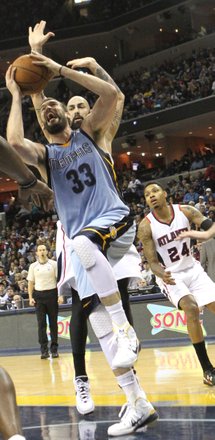 Marc Gasol, who scored 16 points and racked 10 rebounds, is fouled going strong to the basket. (Photo: Warren Roseborough)