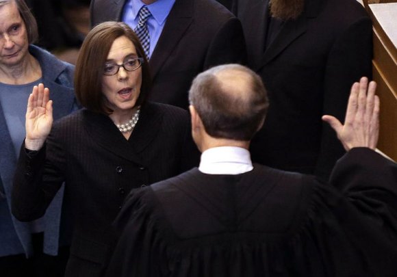 Kate Brown was sworn in Wednesday as Oregon's governor following an influence-peddling scandal that prompted the resignation of fellow Democrat ... Kate Brown was sworn in Wednesday as Oregon's governor following an influence-peddling scandal that prompted the resignation of fellow Democrat ...