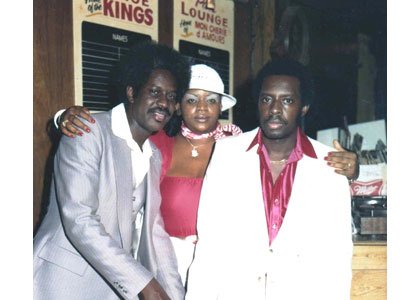 Dave Brice, DJ Coffee, Walter “Sam” Williams in front of Pat’s Lounge back in the day.