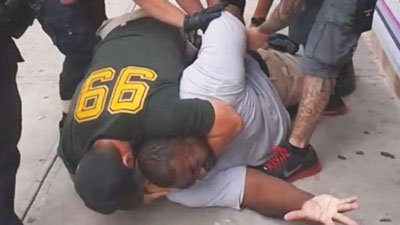 The family of a black man who died after being placed in a white police officer’s chokehold reached a $5.9 ... The family of a black man who died after being placed in a white police officer’s chokehold reached a $5.9 ...