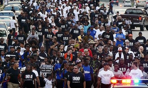 The weather was a steamy 82 degrees on August 16 around 5 p.m. when men in black t-shirts began gathering ... The weather was a steamy 82 degrees on August 16 around 5 p.m. when men in black t-shirts began gathering ...