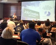 Dr. Glen Fenter, CEO of GMACW, gives a presentation on the importance of job-readiness for high school grads to approximately 51 SCS technical career instructors at ASU Mid-South. (Courtesy photo)