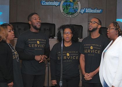 The Perfecting Church's worship team, Seven Electricity led the crowd in a rendition of “Lift Every Voice and Sing."
