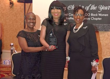 Posing from left to right are Darlene Walker, Gina Burton, Chair of Candace and Champion Honoree and Marguerite Hall, Co-Chair Candace. --Photography by Tony Tyler www.picurphoto.com