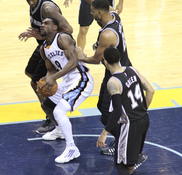With every possession magnified when battling the Spurs juggernaut, Tony Allen retrieves this loose ball for the home team. (Photo: Warren Roseborough)