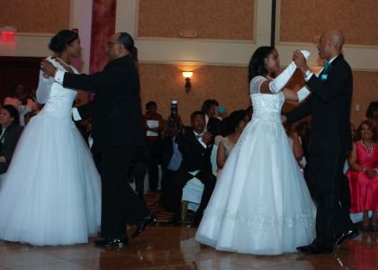 2016 Debutantes Autumn Janee' Harrison and Samantha Lisa Wood with their fathers during the Debutantes and Fathers' Waltz to the song "Daughters" by John Mayer.
