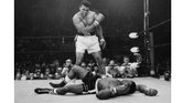 Muhammad Ali taunts Sonny Liston after knocking him out in the first round of their May 1965 rematch, three months after Mr. Ali first defeated Mr. Liston to win the heavyweight title. 