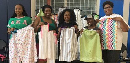 Houston Akas Take Service Globally With Little Dresses Omicron Gamma Chapter Of Alpha Ka Sorority Inc Made 20 Little Dresses For
