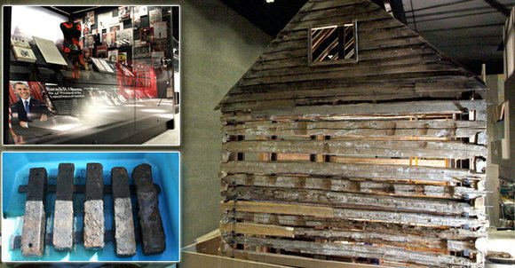 Lonnie Bunch leans forward to peer inside a slave cabin from Edisto Island, South Carolina. The dark and cramped interior ... Lonnie Bunch leans forward to peer inside a slave cabin from Edisto Island, South Carolina. The dark and cramped interior ...