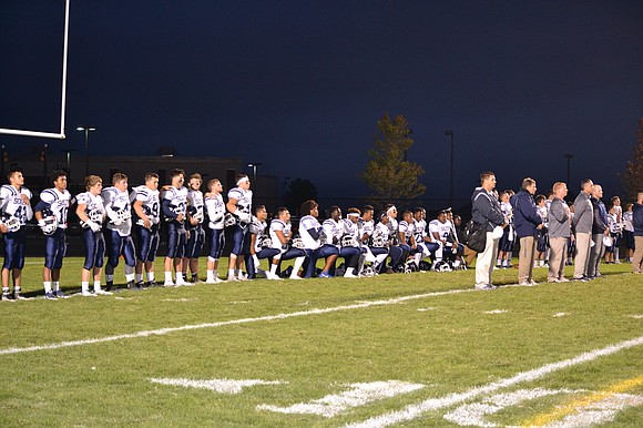 During the National Anthem at Friday's game, members of the Plainfield South football team took a knee to protest police ... During the National Anthem at Friday's game, members of the Plainfield South football team took a knee to protest police ...