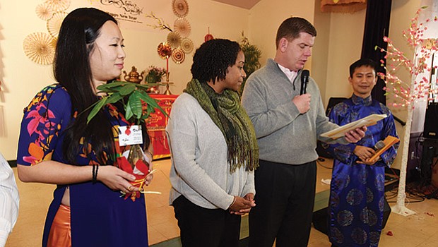 Mayor Martin Walsh and City Councilor Andrea Campbell join Vietnamese community members at Viet Aid’s Fields Corner office in celebration of Tet, Vietnamese Lunar New Year.