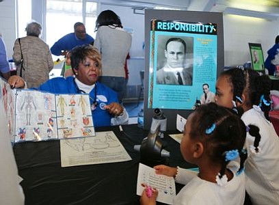 Member of Zeta Phi Beta Sorority, Inc., at the "Blood Plasma and Blood Banks" - Dr. Charles Drew station. -- Photo by April A. Ward