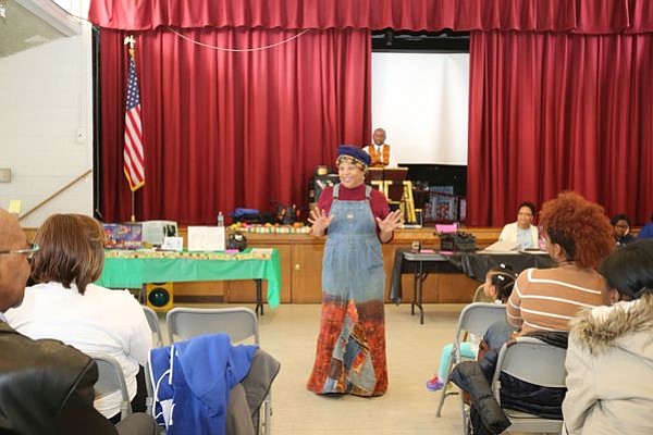 Nationally renowned storyteller, Queen Nur led the crowd in an engagement song describing each of the Inventors highlighted at the Zeta Phil Beta Sorority, Inc Omicron Omicron Zeta Chapter & Williamstown Civic Group, Inc.'s "Making a Way Out of No Way African American Storytelling and Inventors' Museum" event. -- Photo by April A. Ward