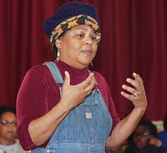 Nationally renowned storyteller, Queen Nur led the crowd in an engagement song describing each of the Inventors highlighted at the Zeta Phil Beta Sorority, Inc Omicron Omicron Zeta Chapter & Williamstown Civic Group, Inc.'s "Making a Way Out of No Way African American Storytelling and Inventors' Museum" event. -- Photo by April A. Ward