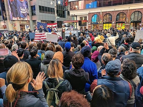 New Yorkers by the thousand, representing myriad backgrounds and faiths, converged on Times Square on Sunday, heeding a music mogul's ... New Yorkers by the thousand, representing myriad backgrounds and faiths, converged on Times Square on Sunday, heeding a music mogul's ...