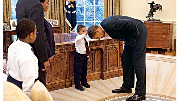 Boy in touching Obama photo looks back on viral moment: ‘It felt just like my hair.’ Boy in touching Obama photo looks back on viral moment: ‘It felt just like my hair.’