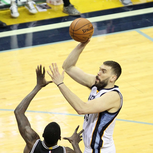 Marc Gasol takes a baby-hook over the San Antonio Spurs.
