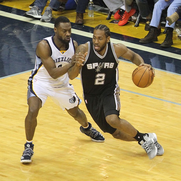 Spurs Forward Kawhi Leonard attempts to drive on Grizzlies Guard Tony Allen during a March 18 matchup at FedExForum. The Grizzlies turned up their defense and used a fourth-quarter burst to take the win, 104-96.