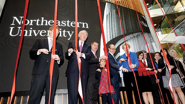 Elected officials join Northeastern University President Joseph Aoun (second from right) for the ribbon-cutting ceremony celebrating the opening of Northeastern University’s Interdisciplinary Science and Engineering Complex on Columbus Avenue.