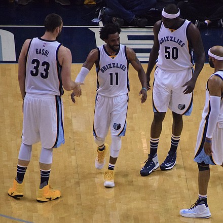 In a game that tested the Grizzlies' heart, Mike Conley gets pumped up after making a highlight-reel basket. (Photo: Karanja A. Ajanaku)