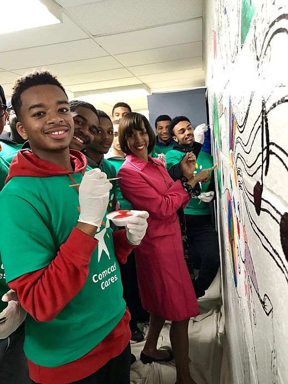 Mayor Catherine Pugh joined youth volunteers to paint a mural inside the Farring Baybrook Recreation Center Mayor Catherine Pugh joined youth volunteers to paint a mural inside the Farring Baybrook Recreation Center