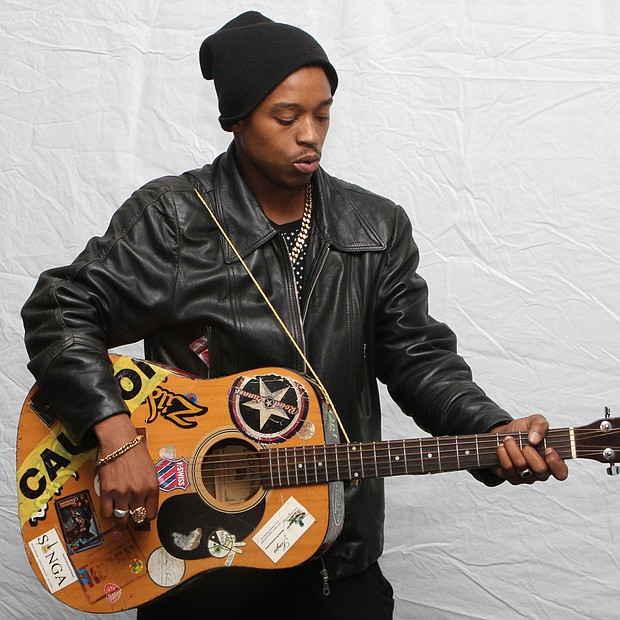 Budding recording artist Singa Bromfield, a member of the 2008 Stax Music Academy Summer Soul Band, is strong on the guitar. (Photo: Warren Roseborough)