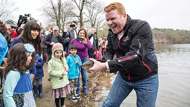 City Councilor Matt O’Malley joined Governor Charlie Baker, state officials and students from Mary Curley Elementary and Middle School to help the Division of Fisheries and Wildlife stock Jamaica Pond in Boston with trout.