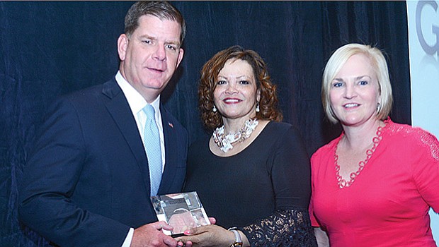 The Massachusetts Women’s Political Caucus presented Mayor Martin J. Walsh with its annual “Good Guys” award on May 5 at the Parker House Hotel in Boston, for his outstanding work in support of women’s issues. Presenting the award are Gail Jackson-Blount, board president (center) and Sarah McCarthy Welsh, executive director.
