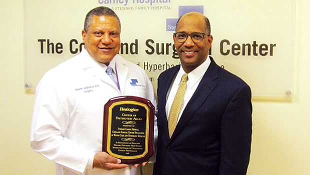 Carney Hospital CEO Walter Ramos and Dr. Martin Williams received a Center of Distinction Award from Healogics, the nation’s leading wound care management company, awarded to the Copeland Surgical Center. The Copeland Surgical Center achieved outstanding clinical outcomes for 12 consecutive months, including patient satisfaction higher than 92 percent and a wound healing rate of at least 91 percent in less than 31 median days. Out of 630 Centers eligible for the Center of Distinction award, 334 achieved this honor in 2017.