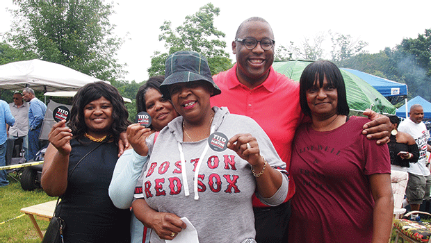 Gaynell McGee, Norma McGee, Kathy Nelson and Gina White enjoy a moment with City Councilor Tito Jackson.