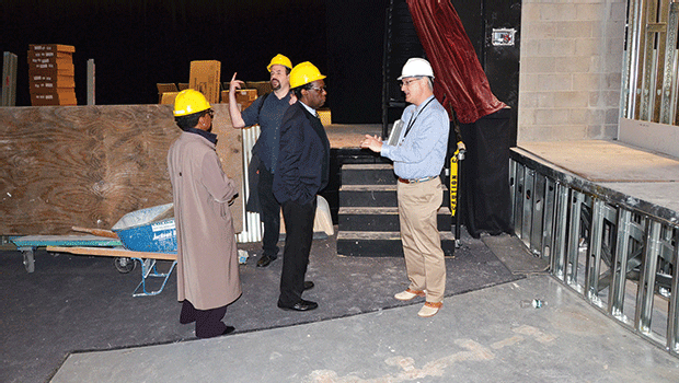 From left to right: Vice President of Advancement and Community Affairs Lorita Williams, Sound Technician Oliver Seagle, Director of Fine and Performing Arts Marshall Hughes, and Vice President of Administration and Finance Kevin Hepner take a tour of the Media Arts Center, mid-renovation.