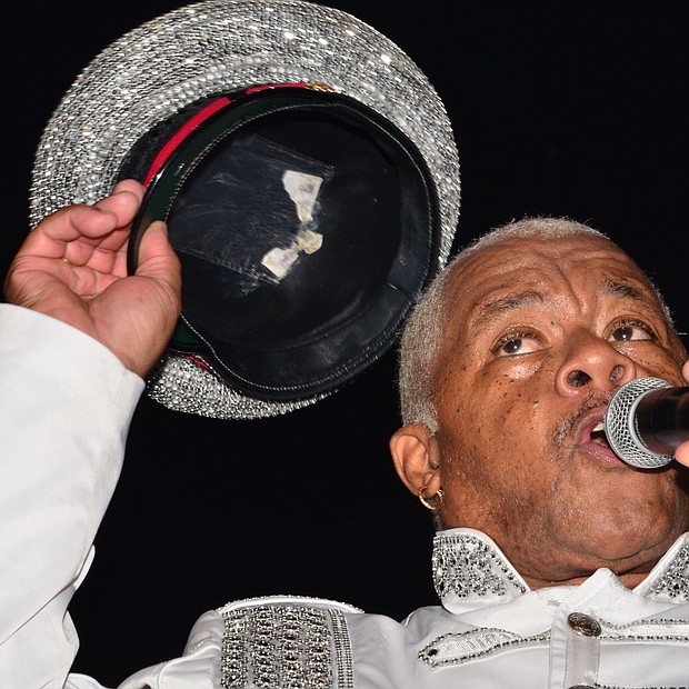 Larry Dodson tips his hat as if to say farewell and thanks.