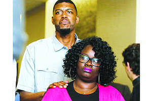 Jordan Edwards' parents Odell and Charmaine Edwards arrive at a news conference. A White former Texas police officer has been indicted on a murder charge in the shooting death of their 15-year-old son, July 17.