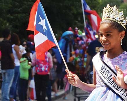 A young princess in the 50th annual Puerto Rican Festival. Thousands of Puerto Ricans turned out to City Hall plaza for this year’s festival.