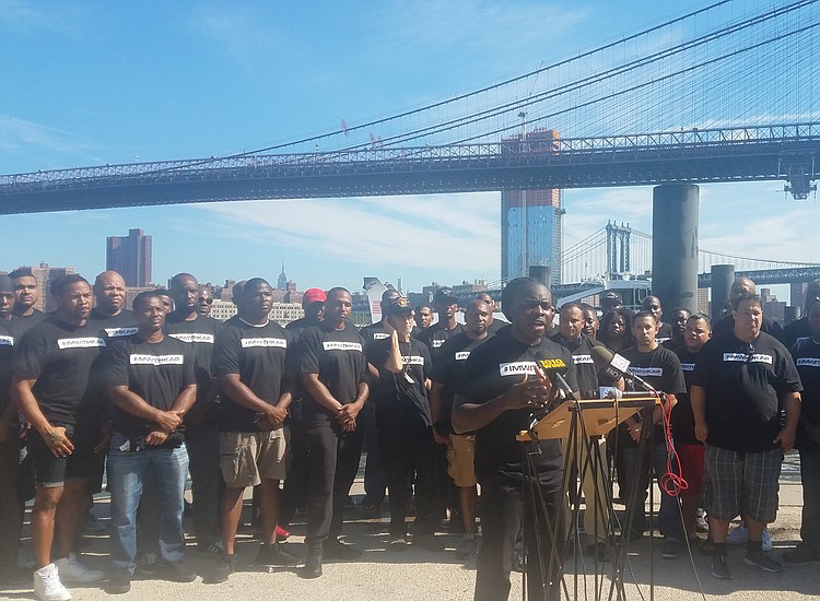 Colin Kaepernick supporters rally for jobless National Football League player