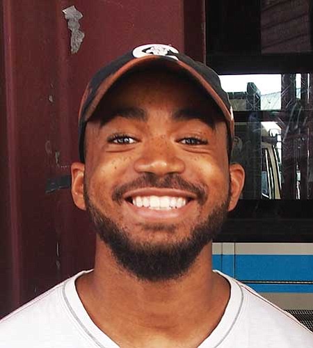 No. I think America has always been racist. Especially on the political and economic levels. Politicians work for white men, not for communities like ours. We’re fighting it, but we’ve got a long way to go. — Tyler Jean Louis, Student, Roxbury