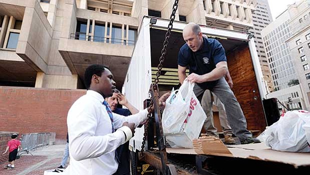 Volunteers at Boston City Hall sort and pack donated items to be transported down to flood victims in Houston, Texas and the surrounding areas that were devastated by Hurricane Harvey.