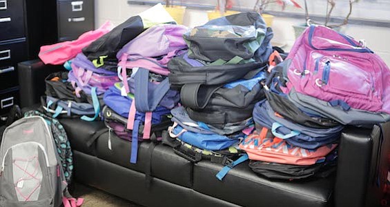 Backpacks filled with school supplies donated by a local church.