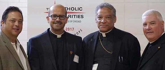 Officials with Catholic Charities, led by President and CEO Monsignor Michael Boland, joined with local residents and officials to dedicate ... Officials with Catholic Charities, led by President and CEO Monsignor Michael Boland, joined with local residents and officials to dedicate ...