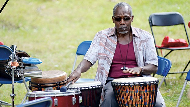 Percussionist Cornell Coley performs during the annual Big Head Festival at the Museum of the Center for Afro-American Artists in Roxbury.