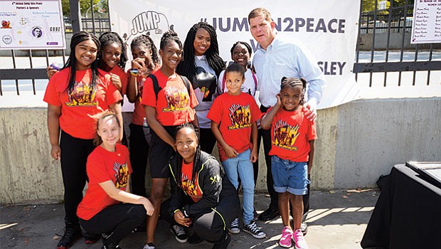 Mayor Walsh joins youth at the annual “Jump In 2 Peace” event with City Councilor Ayanna Pressley.